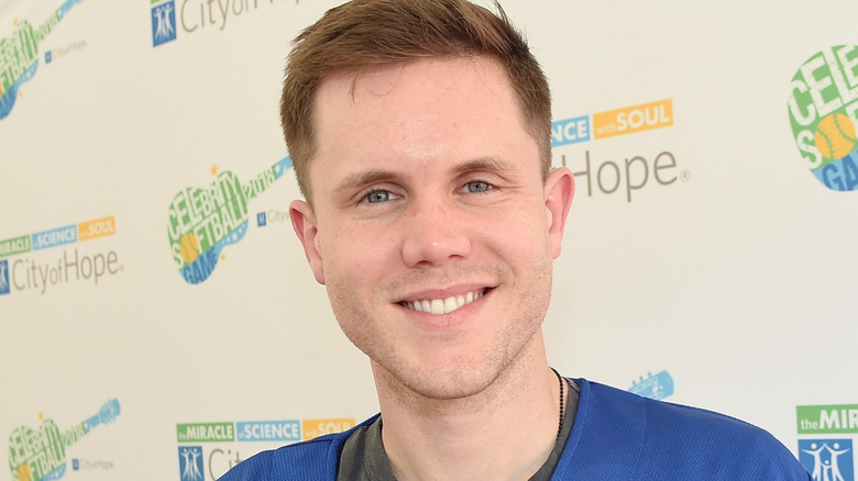 Trent Harmon smiling for photographers at a softball game in Nashville, Tennessee in June 2018