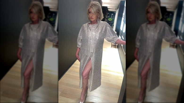 Martha Stewart posing in a sparkly dress with a daringly high split.