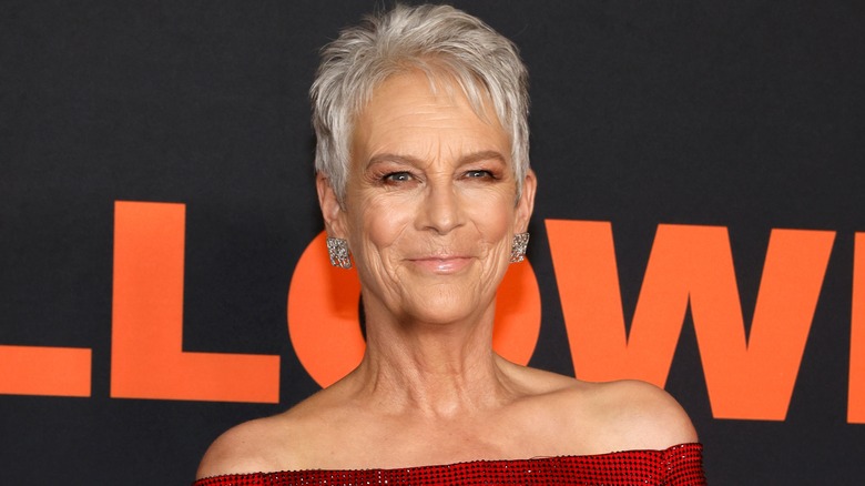 Jamie Lee Curtis smiling red gown