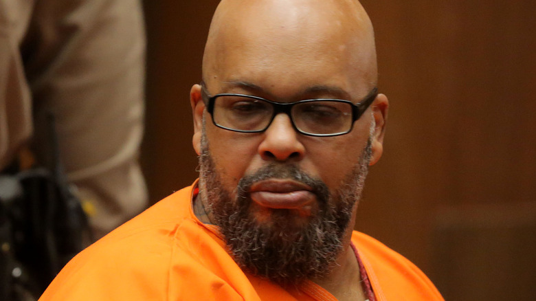 Suge Knight at his sentencing in court in orange jumpsuit