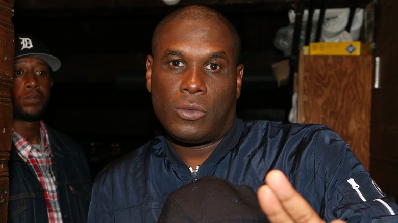 Jay Electronica dressed in a black jacket