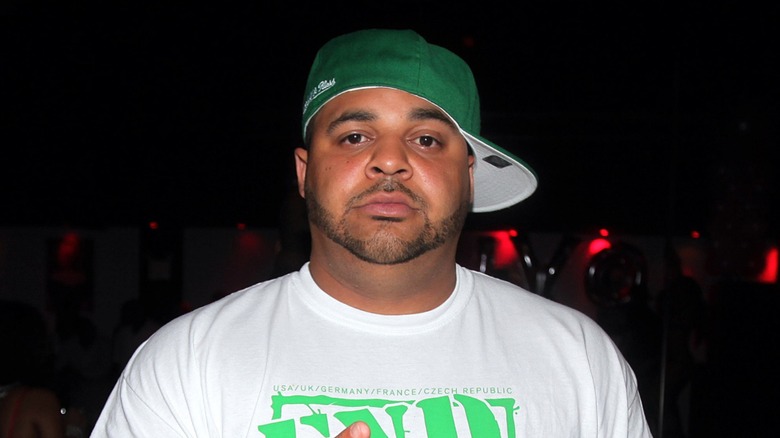 Joelle Ortiz wears a green cap