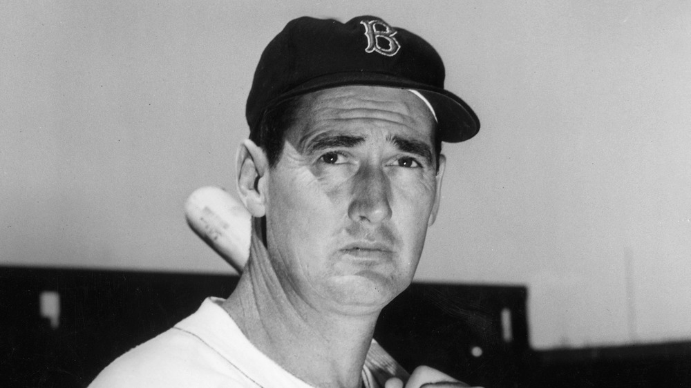 Ted Williams with bat and Boston Red Sox hat