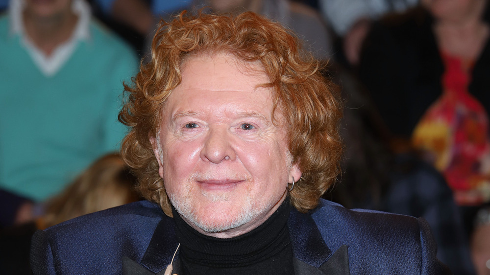 Mick Hucknall smiling