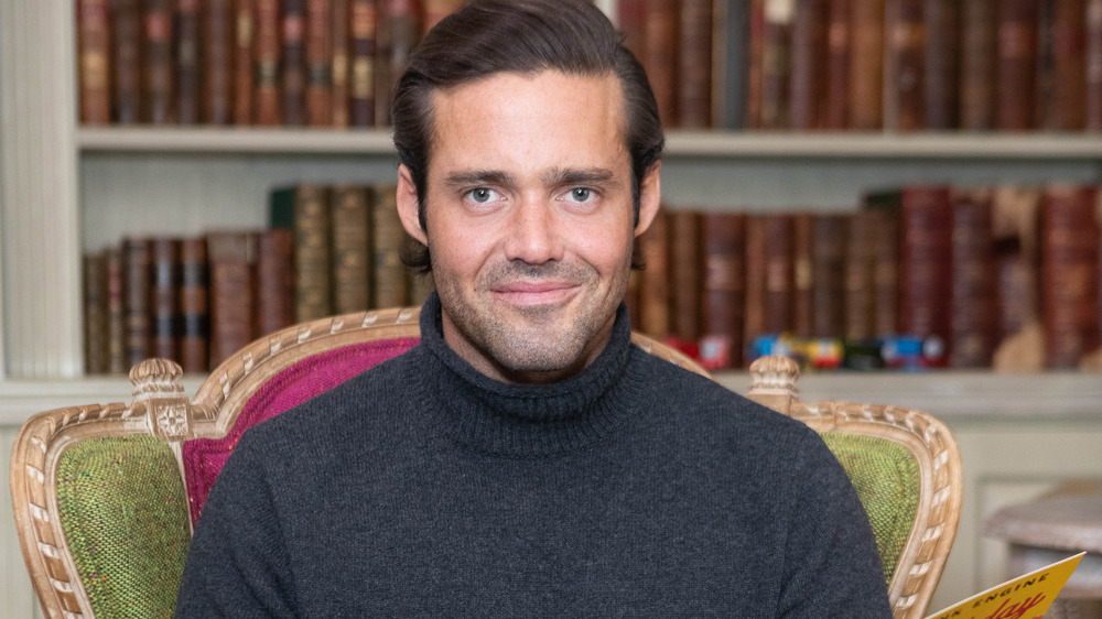 Spencer Matthews with a cheeky grin