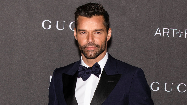 Ricky Martin wearing bowtie, posing