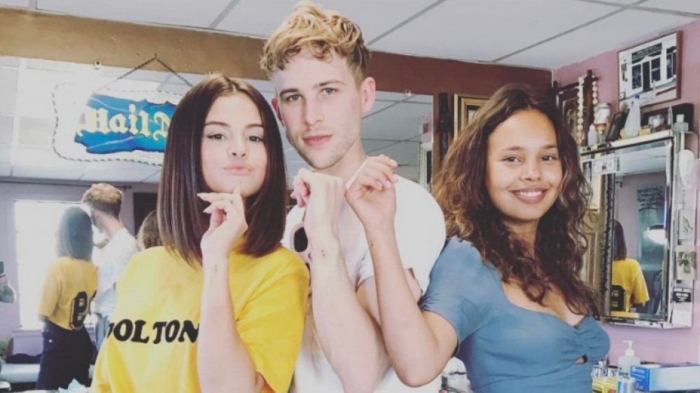 Selena Gomez, Tommy Dorfman, and Alisha Boe all sporting their ink