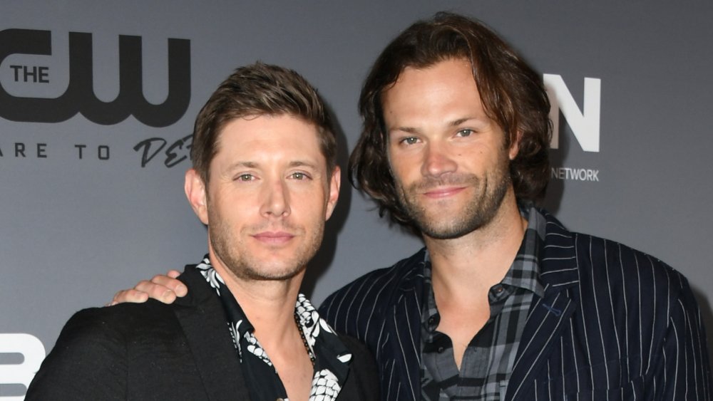 Jensen Ackles and Jared Padalecki arm in arm