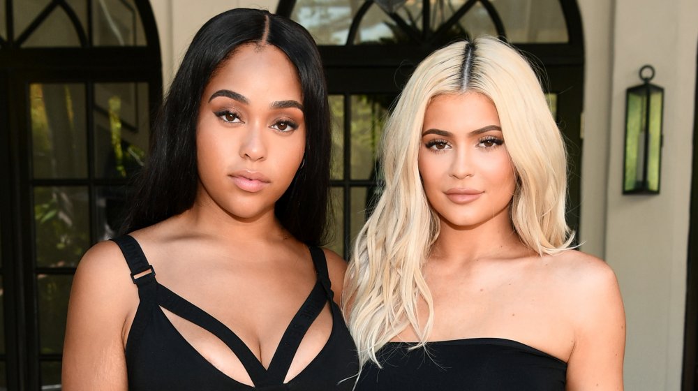 Jordyn Woods and Kylie Jenner posing and looking at camera