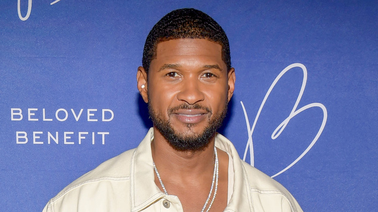 Usher Raymond wearing white