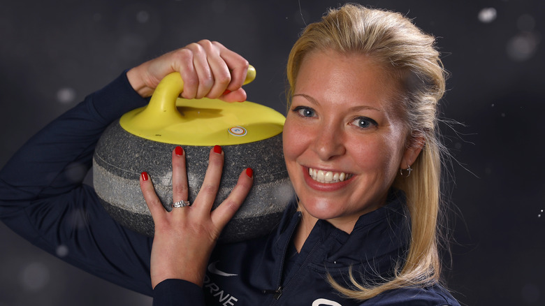 Nina Roth with a curling stone