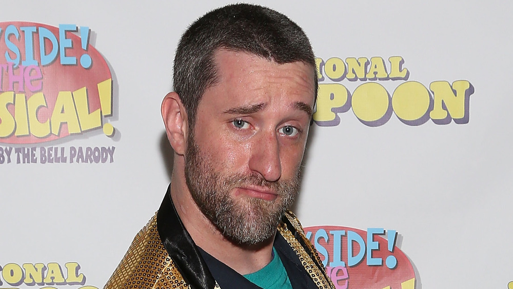 Dustin Diamond posing at an event