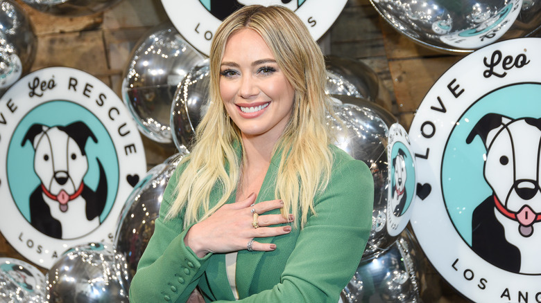 Hilary Duff smiling at puppy charity event