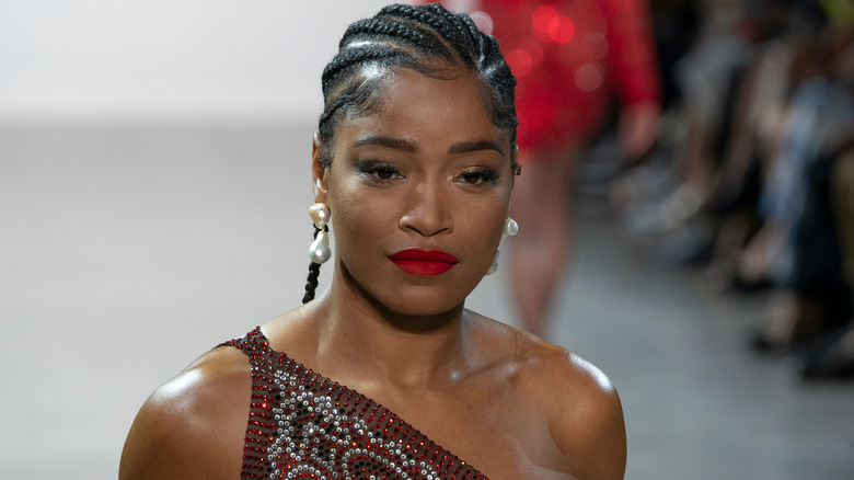 Keke Palmer walking on a runway