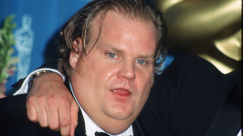 Chris Farley posing 