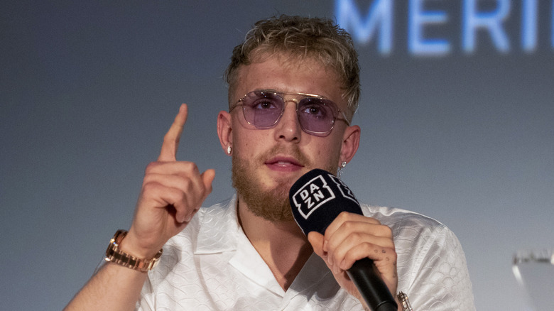 Jake Paul speaking into microphone