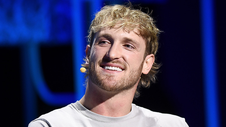 Logan Paul smiling and tilting his head