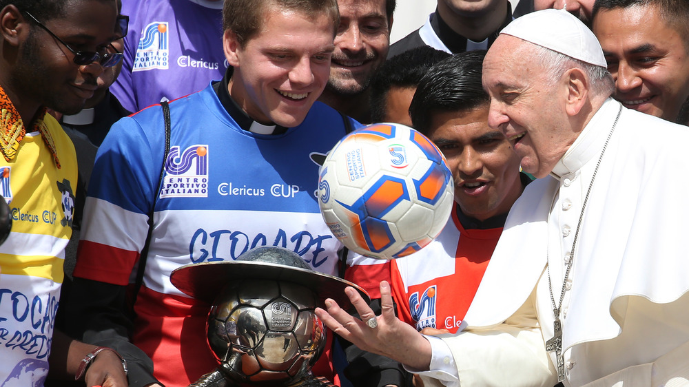 Pope Francis plays with soccer ball at Clericus Cup