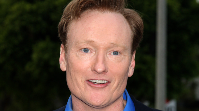 Conan O'Brien looking on