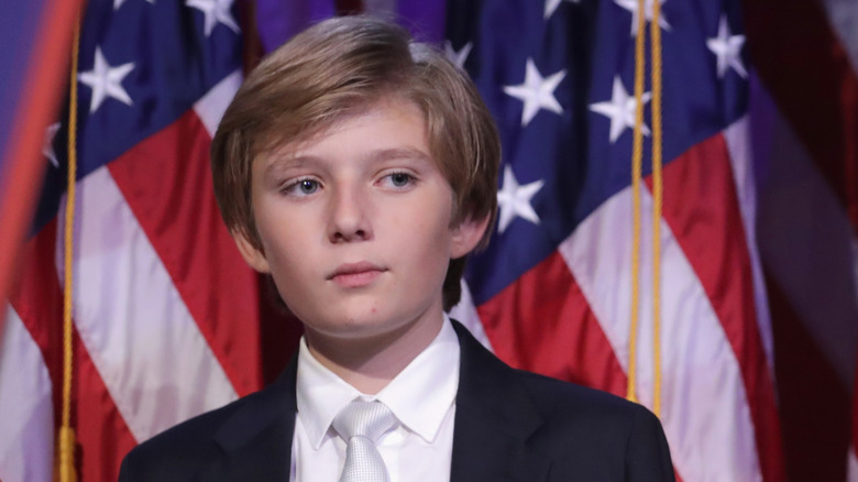 Barron Trump with flags