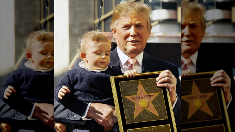Donald Trump holding baby Barron Trump