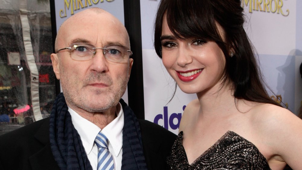 Phil Collins and Lily Collins at the premiere of Mirror Mirror