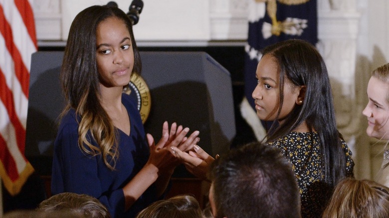 Malia and Sasha Obama looking unimpressed