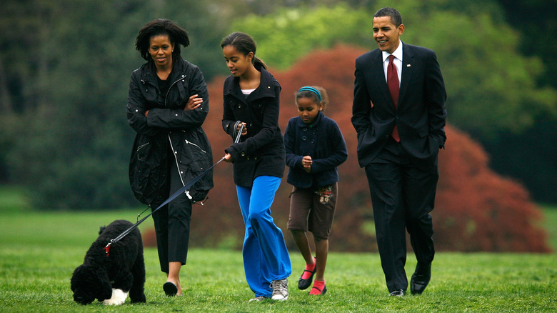 The Obamas walking Bo