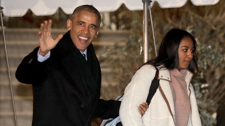 President Barack Obama and his daughter Sasha departing the White House