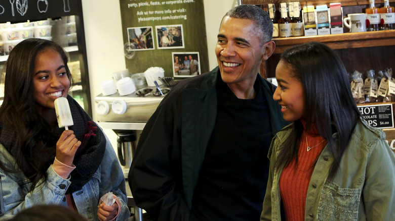 Barack Obama buying ice cream with his daughters