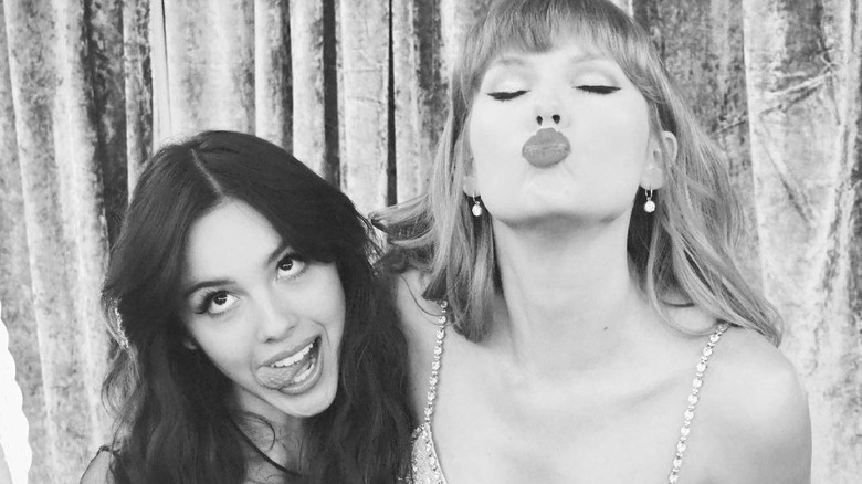 Olivia Rodrigo and Taylor Swift making goofy faces