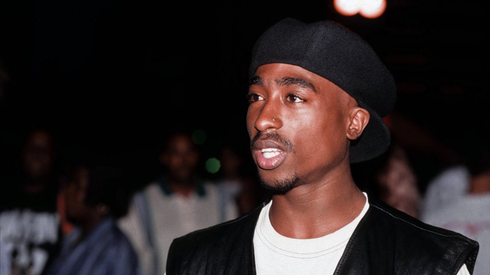 Tupac Shakur wearing black