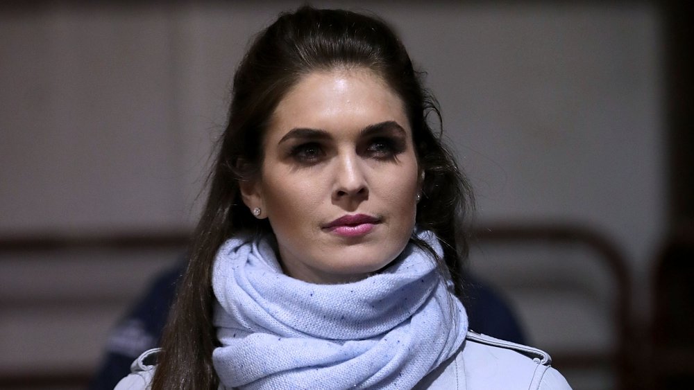 Hope Hicks looking off to the side with a neutral expression