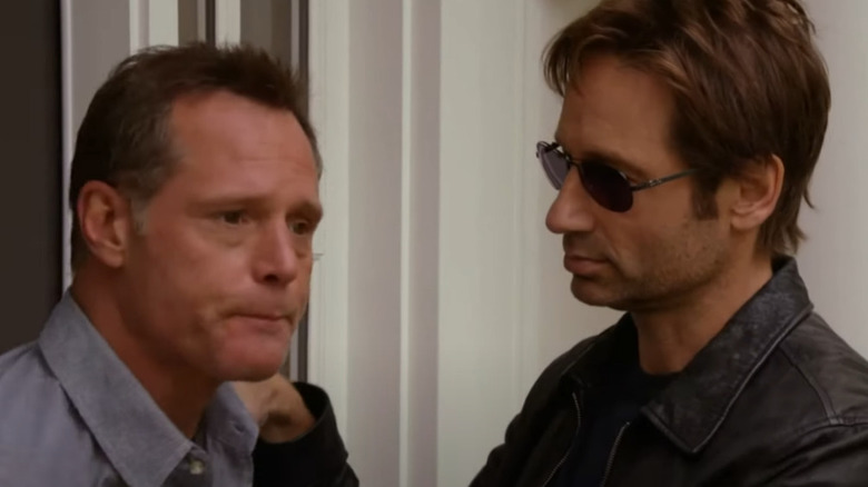 David Duchovny looking at distressed Jason Beghe