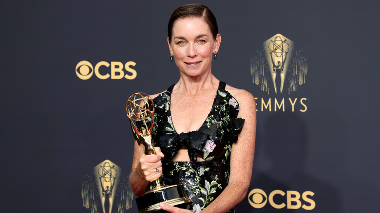 Julianne Nicholson holds an Emmy