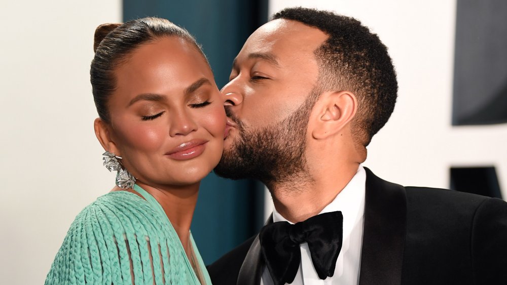 Chrissy Teigen and John Legend attend the 2020 Vanity Fair Oscar Party hosted by Radhika Jones