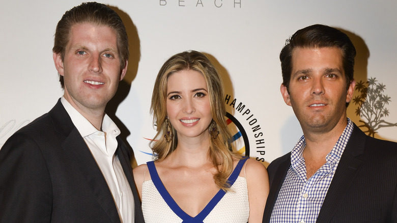 Eric Trump, Donald Trump Jr and Ivanka Trump posing