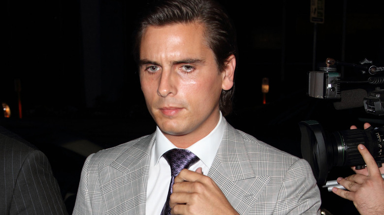 Scott Disick looking to the distance