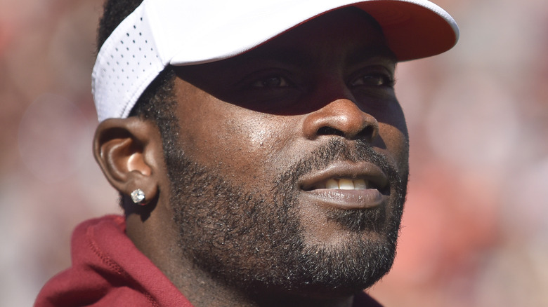 Michael Vick smiles on the field