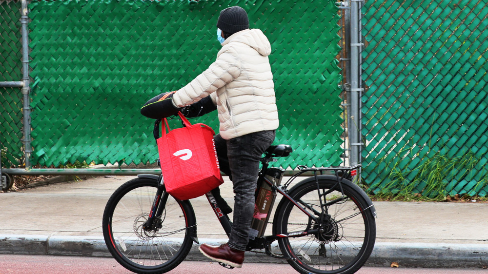 DoorDash delivery person working