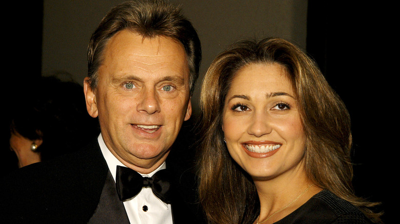 Pat Sajak and Lesly Brown posing