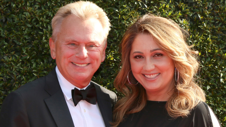 Pat Sajak and Lesly Brown smiling