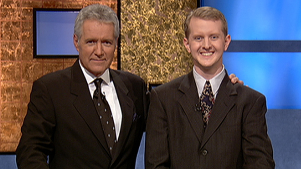 Alex Trebek and Ken Jennings on Jeopardy set