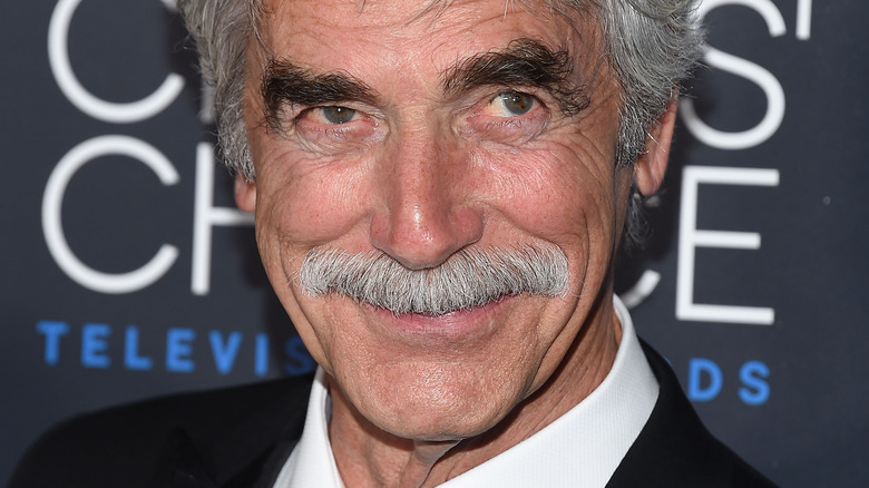 Sam Elliott looking upward