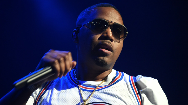 Nas performing live on stage