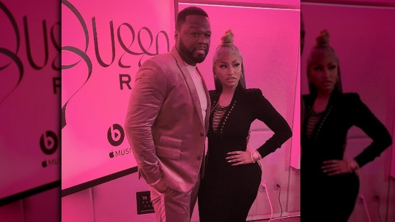 50 Cent posing for a picture with Nicki Minaj