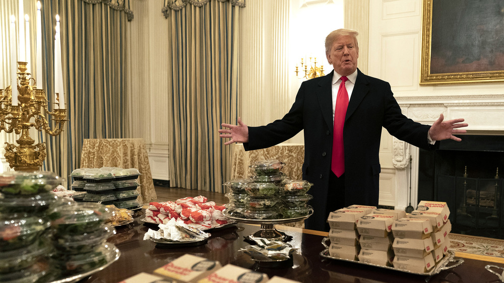 Donald Trump surrounded by KFC