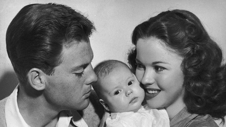 Shirley Temple posing with her family