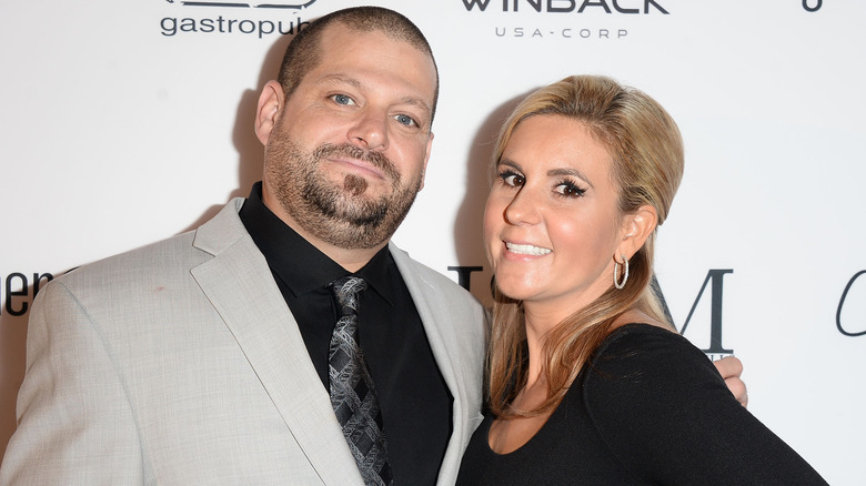 Jarrod Schulz and Brandi Passante smiling on the red carpet