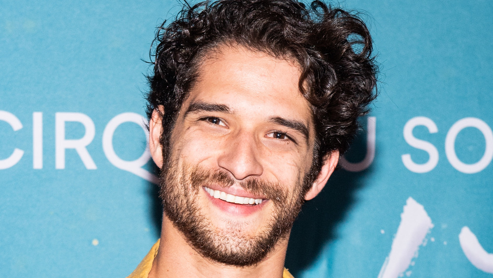 Tyler Posey smiles during the premiere event of "Amaluna"